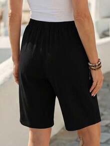 Bermudas, unicolor, con bolsillos laterales, corte holgado, longitud hasta la rodilla, cintura media, estilo básico - Negro - Ver 2