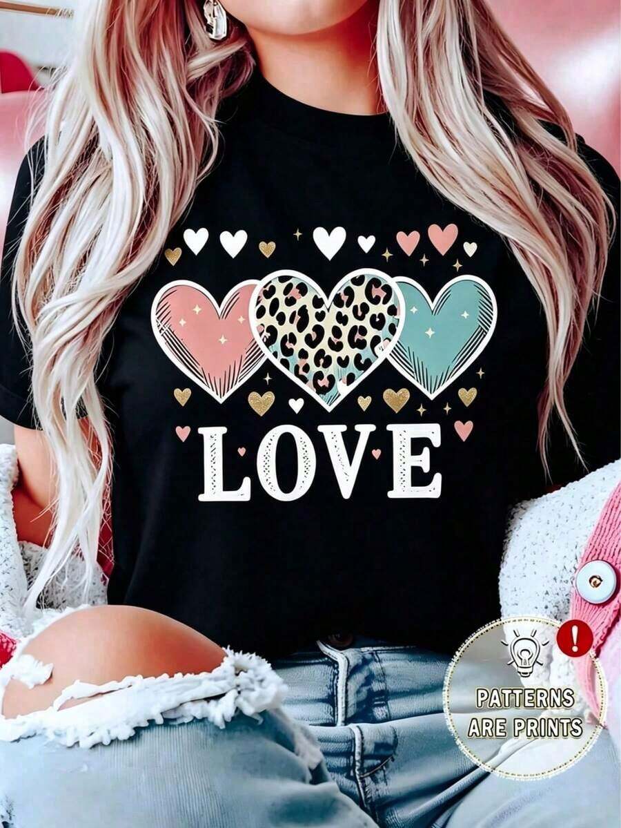 Camisetas estampadas de moda para mujer, tops de estilo urbano de talla grande, camisetas de verano cómodas y elegantes que combinan con todo. Camiseta casual de poliéster para mujer, de cuello redondo, manga corta, longitud regular, con estampado de leopardo y gráfico de corazón. - Negro - Ver 1