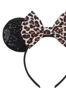 Băng đô tai Minnie họa tiết da báo thời trang của Disney, gồm một chiếc, với nơ họa tiết da báo kết hợp cùng tai Minnie lấp lánh, phụ kiện tóc hình nơ Minnie hoạt hình và phụ kiện hóa trang - hoàn hảo cho các bữa tiệc ở trường, tiệc hóa trang. - màu đen - Xem 4