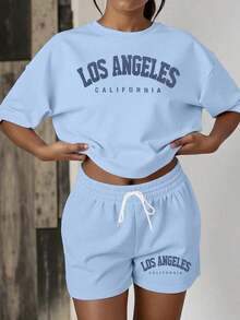 informal de 2 piezas de camiseta de manga corta con cuello redondo y estampado de letras, y shorts para mujer - Azul - Ver 1