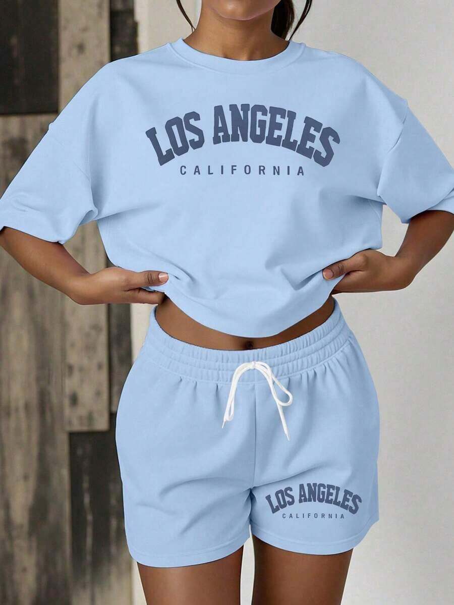 informal de 2 piezas de camiseta de manga corta con cuello redondo y estampado de letras, y shorts para mujer - Azul - Ver 1