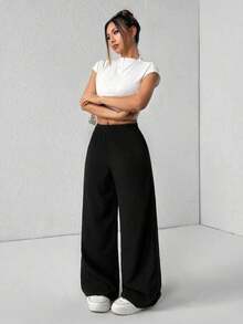 Pantalones de pierna de campana con cintura alta, elásticos y acanalados para mujeres - Negro - Ver 2