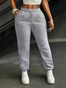 Pantalones deportivos jogger de mujer con unicolor, cintura con cordón y bolsillos - Gris Claro - Ver 3