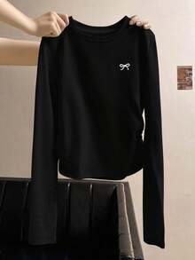 Camiseta casual de manga larga, cuello redondo, con estampado de lazo, color negro para mujer - Negro - Ver 1
