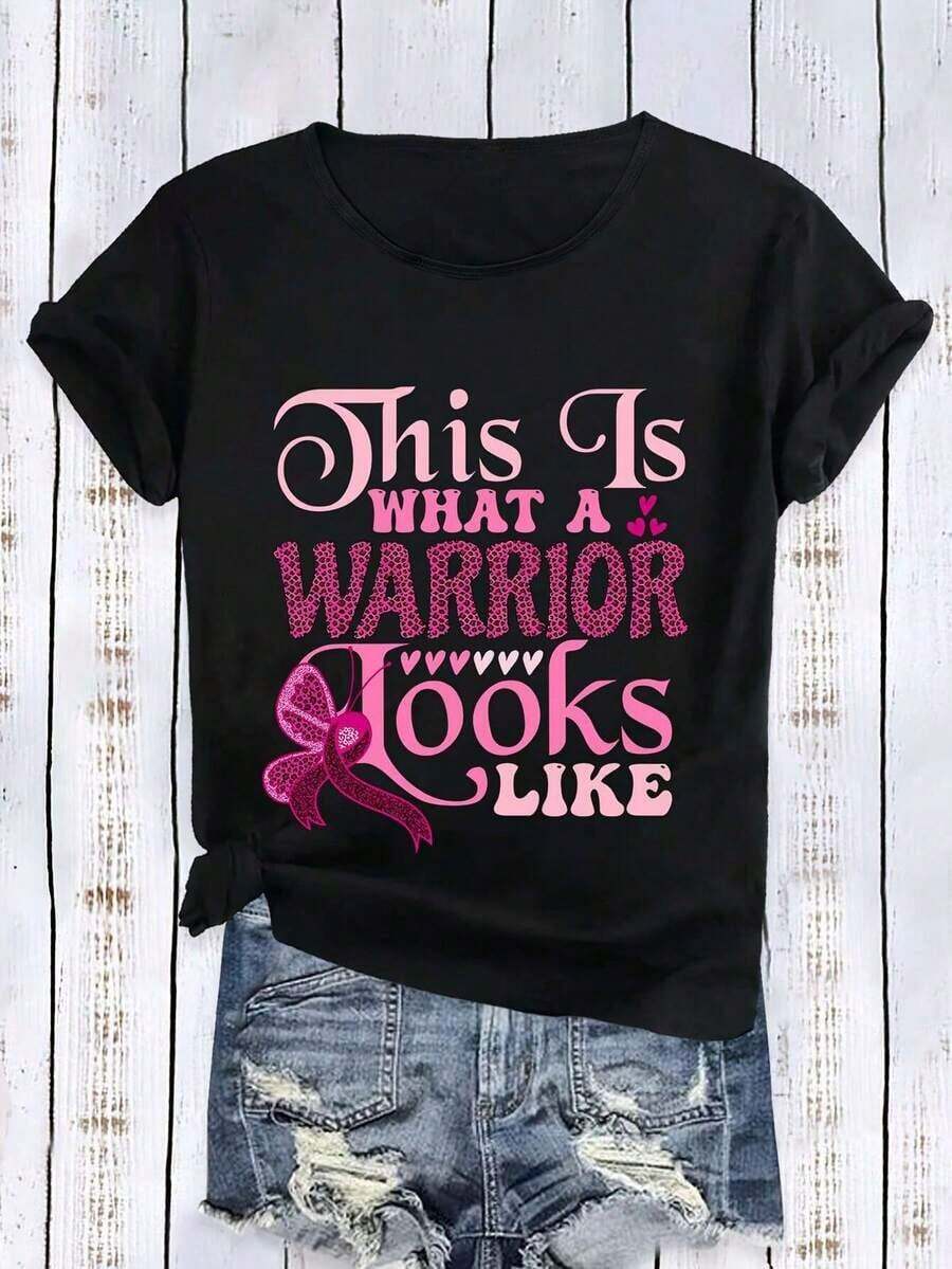 Camiseta de mujer - Estampada con "Así se ve un guerrero" y cintas y texto rosados, 100% de elasticidad media, corte holgado, cuello redondo, adecuada para ropa deportiva casual de uso diario, deportes y actividades de sensibilización. - Negro - Ver 1