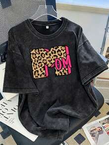 Nueva camiseta de verano vintage de algodón lavado y desgastado, de manga corta, con estampado de leopardo estilo americano y letras MOM, top de talla grande para mujer, corte holgado, hombros caídos, cuello redondo, estilo oversize, cómoda y a la moda, versátil para el día a día, ropa de mujer estilo Y2K. - Negro - Ver 6