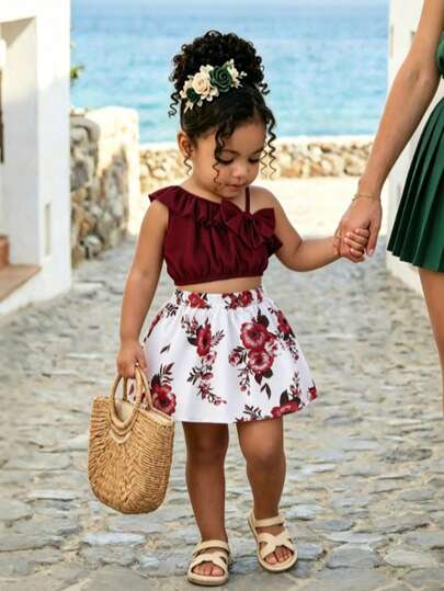 2pcs/Set Baby Girl Fashion Cute Solid Color Asymmetric-Shoulder Camisole Top Paired With Butterfly & Flower Pattern Skirt, Summer Daily Outings & Vacation New Arrival