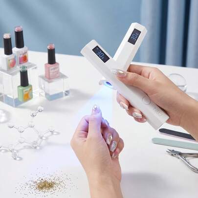 手持式UV LED美甲灯，升级版迷你美甲烘干机，带20秒/60秒定时器和液晶显示屏，8倍凸透镜快速固化美甲灯，适用于所有凝胶指甲油，便携式可充电Type-C接口美甲工具，居家旅行两相宜。礼品