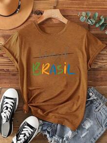 1 camiseta con la palabra "Brasil" escrita a mano y un patrón combinado de coloridas letras mayúsculas "BRASIL" sobre una camiseta de algodón colorida. Nueva camiseta de verano de manga corta para mujer, camiseta estampada casual y a la moda, ropa elegante para mujer, 180g 100% algodón. - Blanco - Ver 7