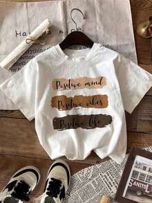 Camiseta Casual de Manga Corta para Mujer con Diseño Gráfico de Letras Inspiradoras y Bloques de Color - Camiseta con Mensaje Positivo, Ropa de Verano, Camiseta Oversize, Streetwear Casual, Cuello Redondo, Algodón, Moda de Verano, Ropa Holgada para Mujer, Camiseta para Uso Diario, Adecuada para primavera, verano y otoño. - Blanco - Ver 7
