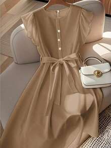 Vestido de mujer de longitud media, cómodo y suave, sin estiramiento, con cuello redondo, mangas de vuelo, cintura elástica, decoración de botones de perla, estilo francés elegante y versátil para vacaciones y viajes, color albaricoque, primavera - Caqui - Ver 1