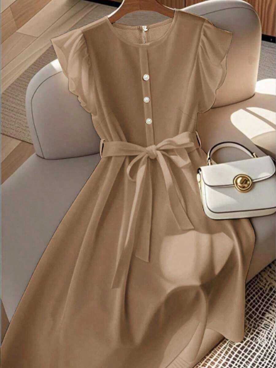 Vestido de mujer de longitud media, cómodo y suave, sin estiramiento, con cuello redondo, mangas de vuelo, cintura elástica, decoración de botones de perla, estilo francés elegante y versátil para vacaciones y viajes, color albaricoque, primavera - Caqui - Ver 1