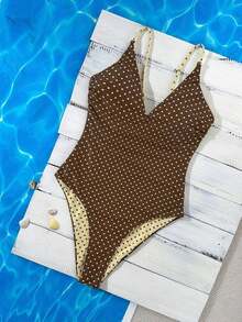 Swim Mod Traje de baño de una pieza con tirantes ajustables y reversible con base amarilla y lunares marrones + rayas marrones y amarillas, Primavera/Verano 2026 - Multicolor - Ver 10