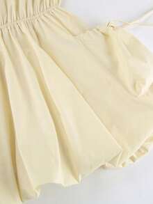 Vestido camisero amarillo de algodón puro primavera 2026, cuello solapa, manga larga, cintura ajustada con lazos y diseño en forma de flor cerrada - Amarillo - Ver 7