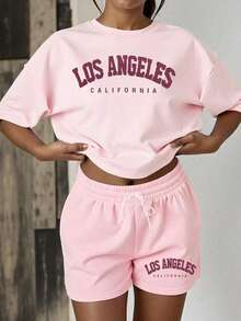 informal de 2 piezas de camiseta de manga corta con cuello redondo y estampado de letras, y shorts para mujer - Rosa - Ver 1