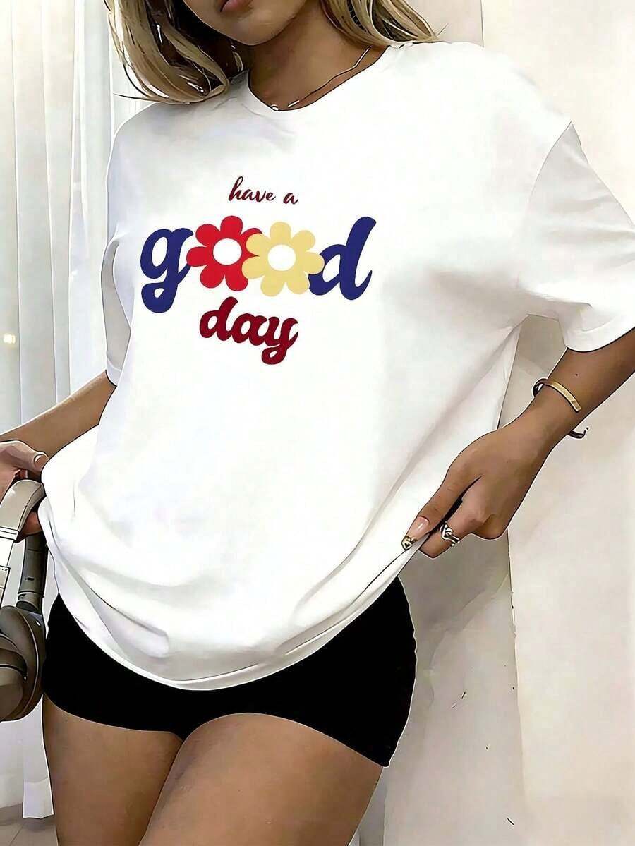 PremiumCamiseta Holgada para Mujer Blanca con Estampado "Have a Good Day" con Flores Coloridas, Cuello Redondo de Manga Corta, Top Casual Inspirador, Ropa Cómoda para Uso Diario y Ocasiones Informales, Estilo Primaveral Eco-Friendly - Blanco - Ver 1