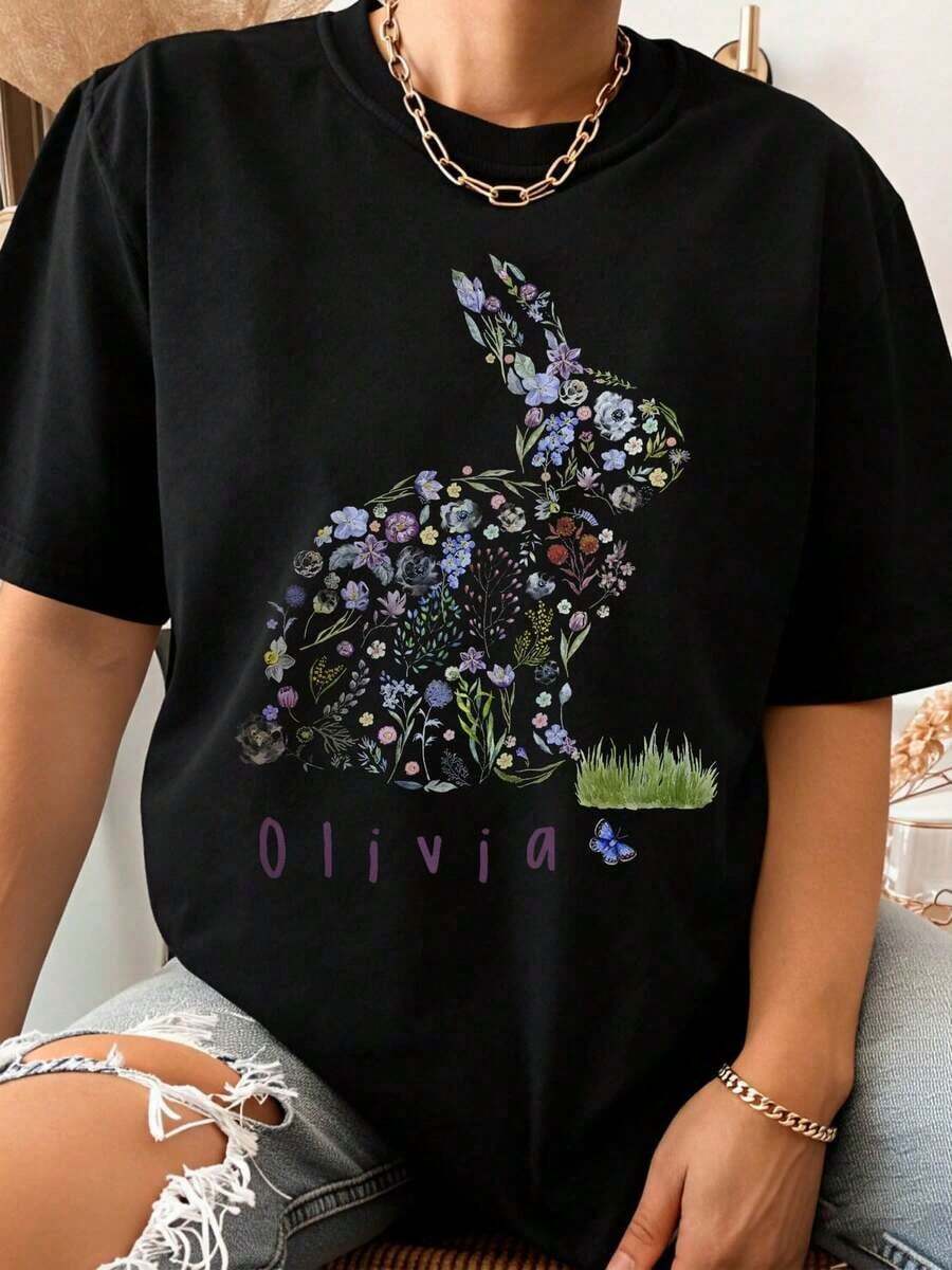 Camiseta con diseño de conejo floral para mujer, nombre personalizado Olivia, regalo de primavera/pascua, estampado de animales lindo, corte holgado, estilo casual, estilo vintage urbano, unisex, camiseta de algodón de manga corta con cuello redondo, blusas para mujer. blusas.blusas casuales para dama. - Negro - Ver 1