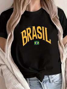 Women's Brazilian Flag National Pride Graphic Tee, Black With Bold Yellow BRAZIL Lettering And Green Emblem, Casual Short-Sleeve Crew Neck Tee, Medium Stretch, Machine Washable, All-Season Comfort, Summer Fashion, Patriotic Design, Comfortable Fit, Printed Tee, Patriotic Shoppers. Ideal Gift. Women's Tee. Stylish. Bohemian Style. Soft, Breathable, And Comfortable Garment, Perfect For Spring, Summer, And Fall; Ideal For Vacations, Travel, And Everyday Wear. Perfect For Watching A Game. - 黑色 - 查看 1