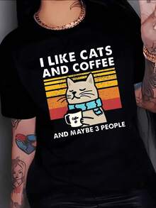 Relaxed Cat With A Blue Scarf Holding A Cup Of Coffee Against A Warm Striped Background Conveying Calm And Humor For Coffee And Cat Lovers. Comfortable And Modern Casual Women's T-Shirt - 黑色 - 查看 8