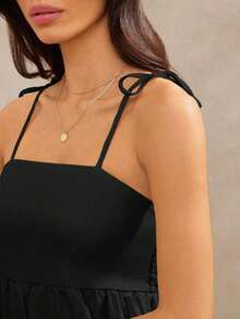 Top tipo camiseta sin mangas con tirantes tipo espagueti, lazo, espalda fruncida, dobladillo abullonado, estilo cowgirl, perfecto para el verano, primavera o vacaciones en la playa - Negro - Ver 2
