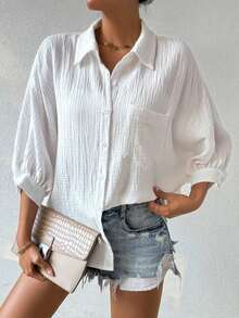 Camisa de mujer minimalista y casual de unicolor con botones delanteros, textura y hombros caídos - Blanco - Ver 4