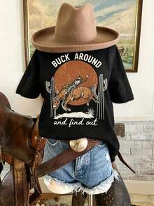 Camiseta Divertida de Mujer con Frases del Oeste "Bu Aro And Find" - Diseño de Sombrero de Vaquero con Patrón de Chica Vaquera y Cactus del Desierto, Camiseta Casual Verde Estilo Country, Adecuada para Festivales de Música Country, Rodeos y Uso Diario, Lavable a Máquina para Todas las Temporadas, Cómoda, Corte Holgado con Estampados Occidentales Brillantes, Tela Suave Fácil de Cuidar, Perfecta para Eventos Casuales y Fiestas Temáticas, Ajuste Diario para Hombres y Mujeres, Blusas para Mujer, Ropa de Vacaciones para Mujer. - Negro - Ver 5