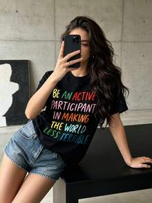 Camiseta de manga larga con frase divertida |   Sé un participante activo en la mejora del mundo, camiseta gráfica inspiradora, de peso pesado 180 g/m², 100% cuello redondo, gris claro con estampado grande y colorido, estilo casual, adecuada para todas las estaciones, cuello redondo, talla grande. - Negro - Ver 1
