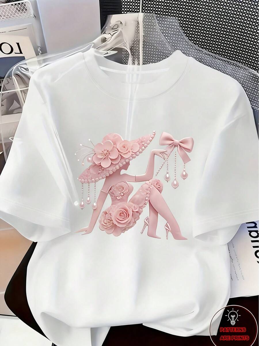 Camiseta de algodón suave para mujer, corte holgado con estampado gráfico, elegante silueta femenina floral rosa con lazo y perlas, transpirable y cómoda, cuello redondo informal, ideal para uso diario, estética femenina y conjuntos románticos.