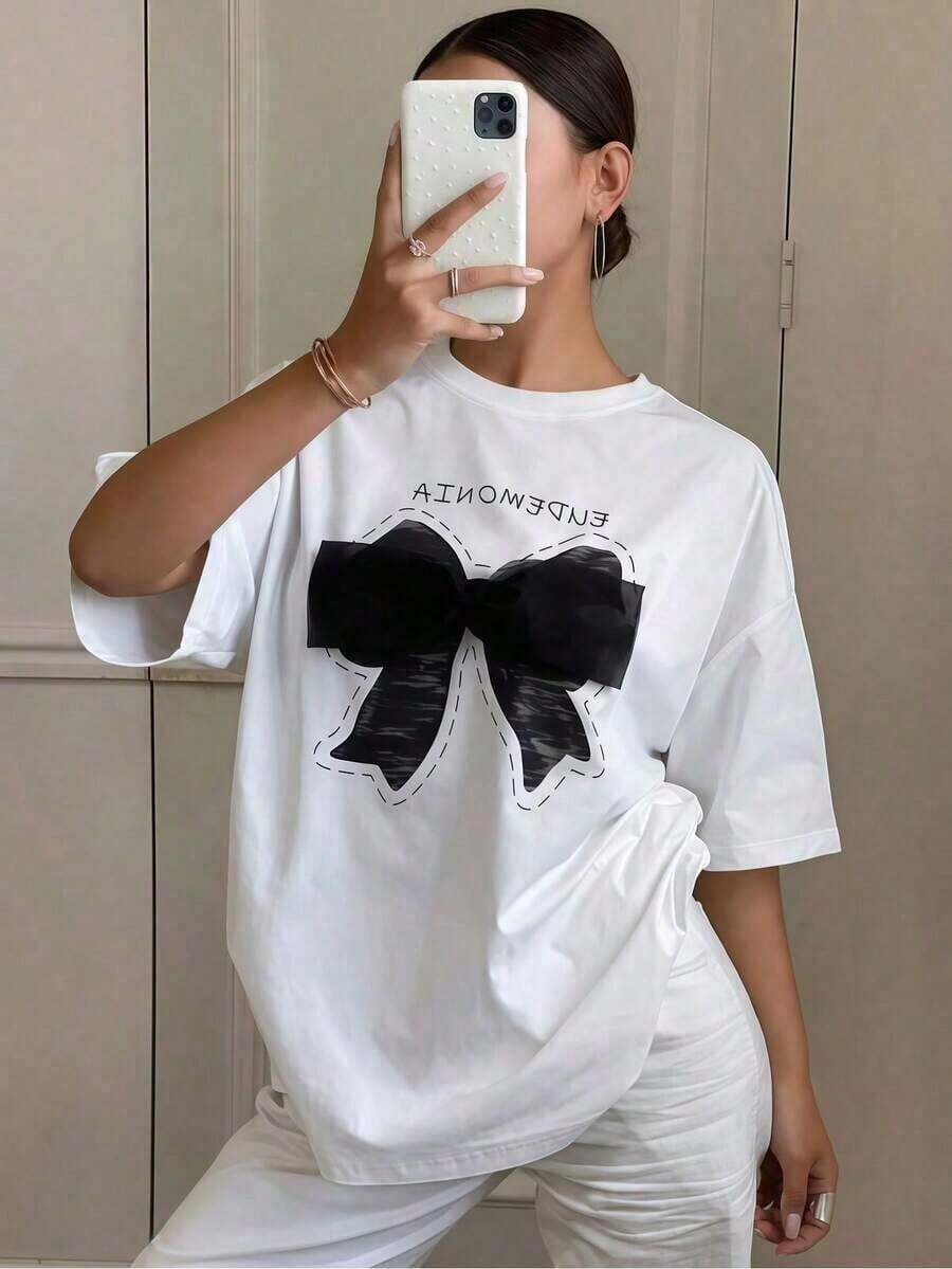 1 pieza de ropa para mujer, camiseta blanca con estampado de lazo, camisas, top blanco, camisetas gráficas para mujer, camiseta unisex casual de cuello redondo, tejido ligero de 220 g/m², lavable a máquina, para primavera/verano/otoño, Día de San Valentín/Navidad/Acción de Gracias, conjuntos de verano 2026 para mujer, conjuntos de vacaciones para mujer, conjuntos de playa para mujer, conjunto para concierto en el campo, conjunto para concierto, ropa casual de negocios para mujer, estilo vintage de calle, unisex, camiseta de manga corta de algodón suelto con cuello redondo, 100% algodón. - Blanco - Ver 1