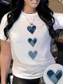 Camiseta informal de manga corta y cuello redondo para mujer con estampado de corazón en patchwork vaquero. Top de poliéster bonito para looks de diario. - Blanco - Ver 1