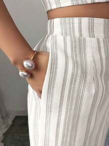 conjunto de 2 piezas de primavera/verano con top sin mangas de lino texturizado a rayas azul y blanco, y pantalones casuales acampanados con bolsillos duales, elegante estilo casual - Gris Claro - Ver 3