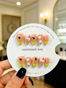 10 Pieces Of Hand-Made Almond-Shaped Press-On False Nails In A Vibrant And Playful Style. With A Sheer Nude Base, They Feature Hand-Painted French Tips In Lemon Yellow, Paired With 3D Black Ladybugs And White Petals. Cute And Lovely, They Are A Must-Have For Sweet Girls And Come With A Tool Kit. Handmade Press On Nails - Yellow - View 11
