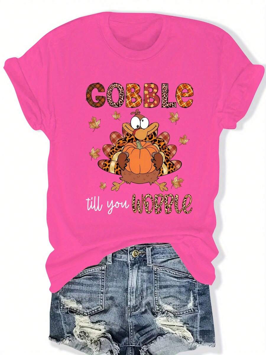 Camiseta Gráfica Rosa de Talla Grande para Mujer con la Frase "Gobble Till You Wobble" - Cuello Redondo Casual, Manga Corta, Diseño Temático de Otoño y Halloween con Calabaza y Hojas de Otoño, Ropa Casual|Estampado Divertido|Tela Elástica - Rosa Fucsia - Ver 1