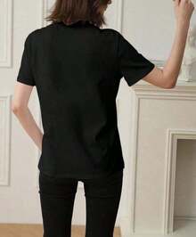Women's Short-Sleeved T-Shirt With A Round Neck, Loose-Fitting, Casual, And Versatile. Featuring A Modern, Elegant, And Sophisticated Print Of Simple Letters, Ideal As A Wardrobe Staple; Made From Soft Fabric With A Great Drape - Unisex Short-Sleeved T-Shirt With A Round Neck, Made Of Loose-Fitting Cotton In An Urban Vintage Style. - 黑色 - 查看 2