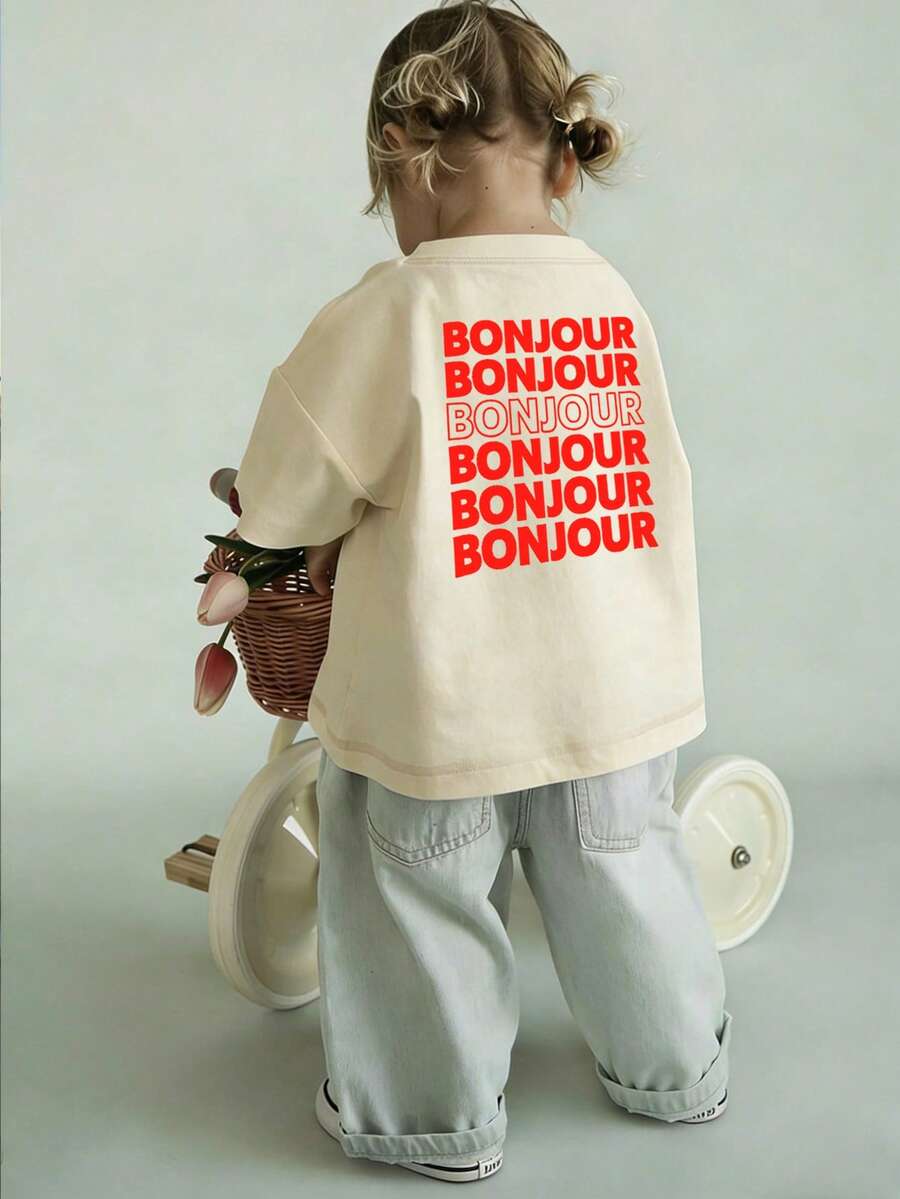 Young Girl Light Yellow "BONJOUR" Letter Print Short Sleeve T-Shirt, Young Girl Casual Loose Fit Tee - Apricot - View 1