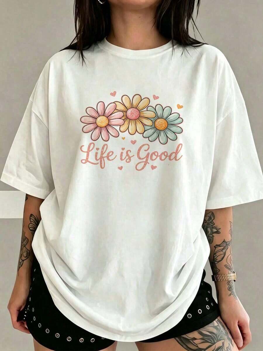 PremiumCamiseta Holgada para Mujer Blanca con Estampado de Margaritas Multicolor y Corazones, Cuello Redondo de Manga Corta, Top Casual con Diseño Floral Alegre, Ropa Cómoda para Uso Diario, Estilo Relajado para Verano y Salidas Informales Eco-Friendly - Blanco - Ver 1