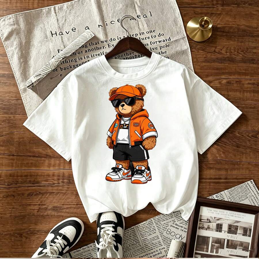 Teddy Bear Fashion Streetwear Orange Jacket Black Shorts White Sneakers Cool Accessories Baseball Cap Sunglasses Urban Style Youthful Trendy Apparel Graphic Design Print On Women's Short Sleeve T-Shirt Mexican Shopping Platform Search Keywords - Blanco - Ver 1