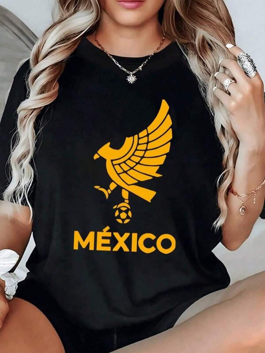 Ave dorada de inspiración mexicana que simboliza fuerza libertad y orgullo nacional con alas extendidas representando el espíritu de superación en cada paso camiseta de mujer casual moderna y cómoda - Negro - Ver 1