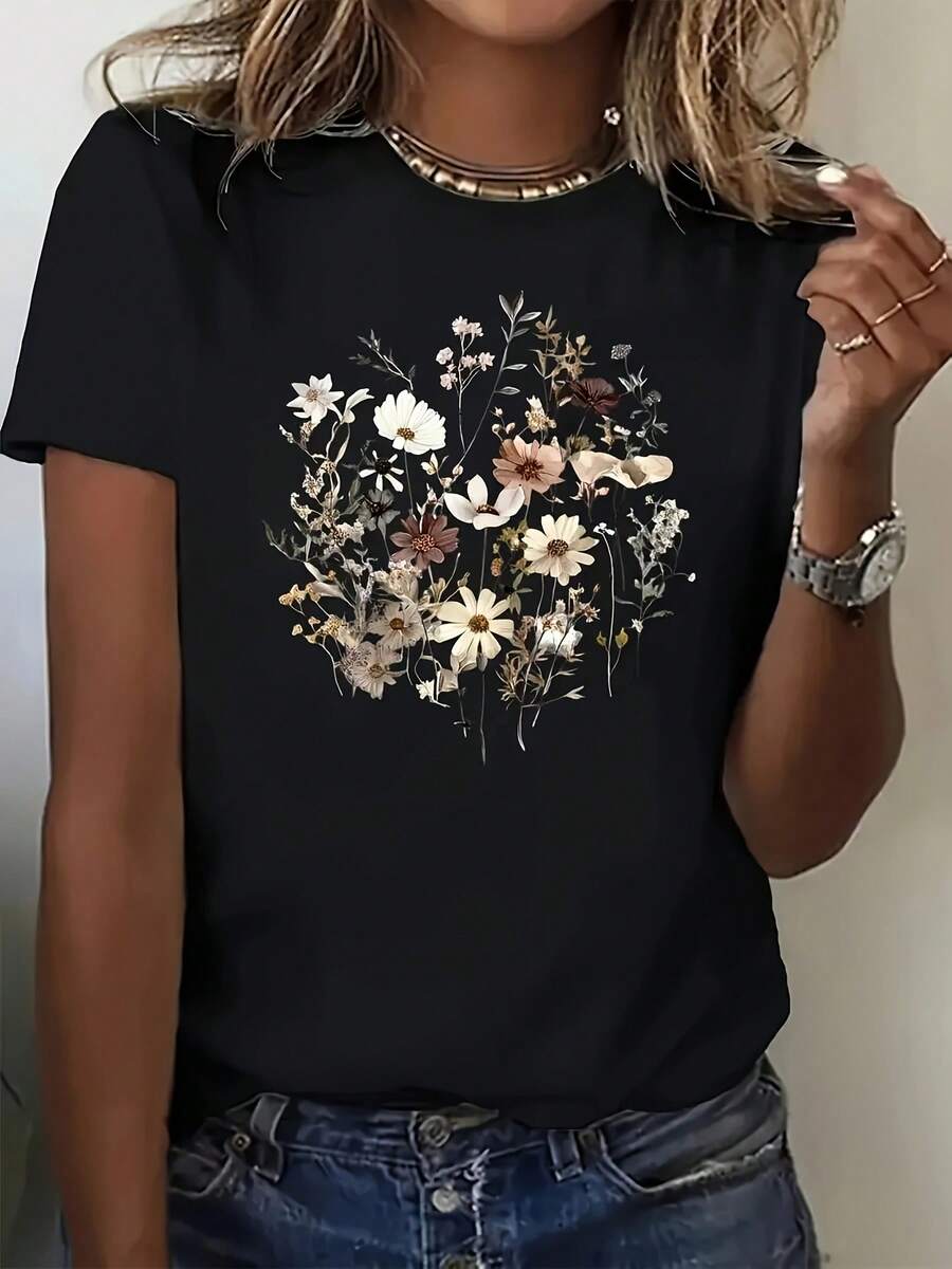 Camiseta casual floral para mujer - Manga corta, cuello redondo, mezcla de poliéster ligero, estilo de verano con flores rosadas vibrantes, blancas y azules, perfecta para ropa casual. - Negro - Ver 1