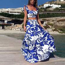 Conjunto de mujer dos piezas con top crop y falda larga maxi de estampado floral, escote halter, cinturón alto, tejido ligero y transpirable ideal para playa, vacaciones y verano, estilo boho chic perfecto para fiestas en la playa y resorts - Azul - Ver 5