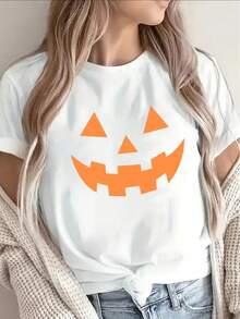 Camiseta de Manga Corta Negra con Estampado Grande de Cara de Calabaza Sonriente Naranja - Cuello Redondo de Poliéster Ligero y Duradero para Disfraces de Halloween, Uso Casual, Fiestas, Truco o  - Ajuste para Todas las Estaciones (Tallas) - [Blanco] - Ver 1