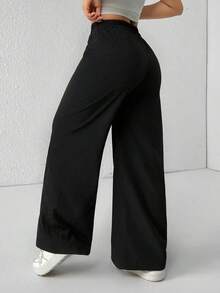 Pantalones de pierna de campana con cintura alta, elásticos y acanalados para mujeres - Negro - Ver 3
