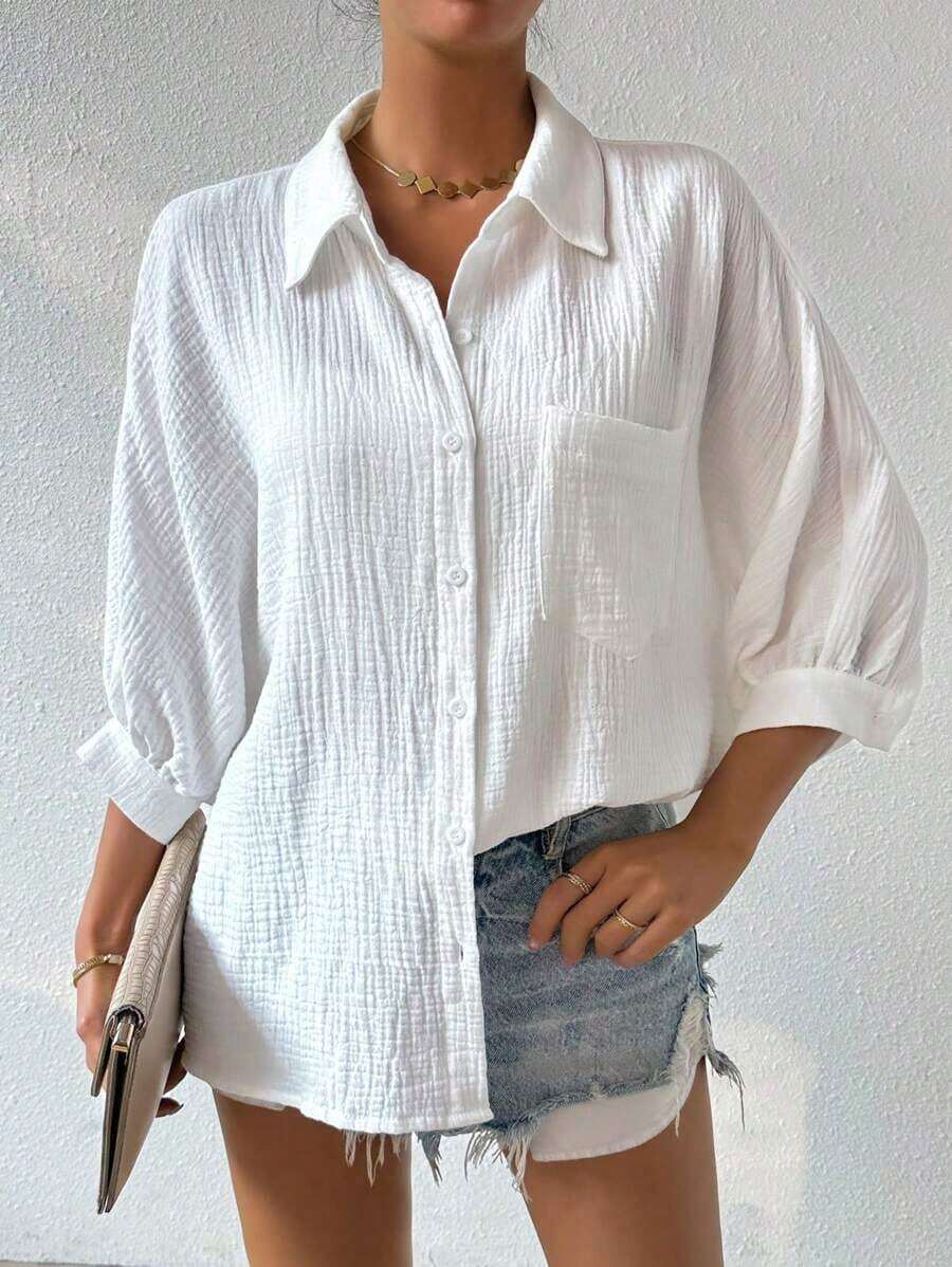 Camisa de mujer minimalista y casual de unicolor con botones delanteros, textura y hombros caídos - Blanco - Ver 1