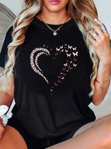 Suave, transpirable y ligera para comodidad durante todo el día, Camiseta Over D - Manga Corta, Cuello Redondo, Color Negro con Estampado de Corazón de Leopardo Salvaje y Adecuada para Todo Tipo de Cuerpo - Tejido Elástico Suave, Lavable a Máquina, Ideal para Uso Casual y el Día de San Valentín - Cuello redondo clásico con un corte relajado que favorece todas las formas del cuerpo y es fácil de combinar con jeans, shorts y leggings. - Negro - Ver 3