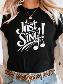 Camiseta de manga corta para mujer con cuello redondo y estampado de texto "¡Simplemente Canta!" de estilo retro y diseño sencillo, ideal para salidas informales, regalos de vacaciones y conjuntos elegantes y prácticos para reuniones de amigos en el verano. - Negro - Ver 1