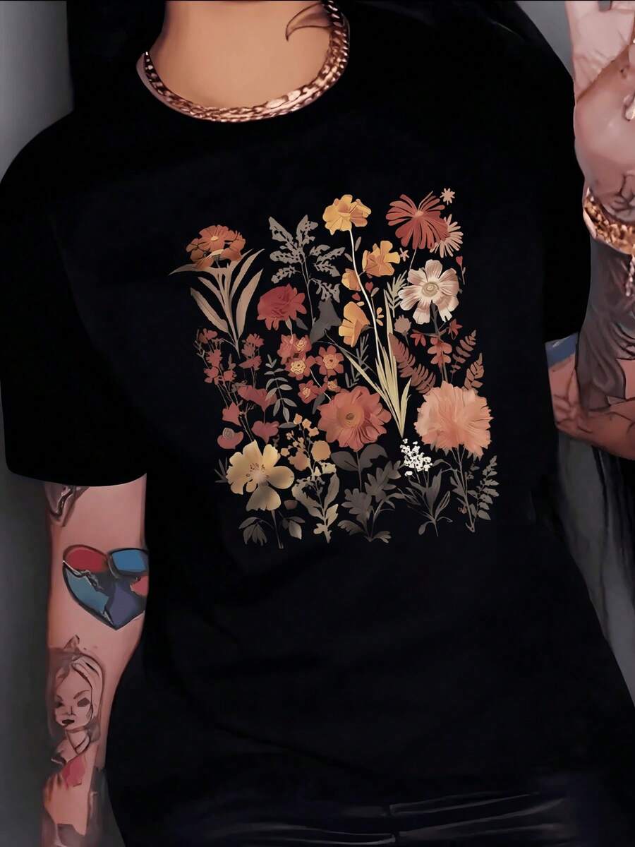 Flores silvestres en tonos cálidos que simbolizan la conexión con la naturaleza y la energía positiva camiseta de mujer casual cómoda de manga corta blanca ideal para uso diario - Negro - Ver 1