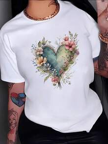 A Green Heart Surrounded By Colorful Flowers Symbolizing Love, Nature, And Hope, Connecting The Soul's Energy With The Beauty Of Life. A Comfortable, Modern, Casual Women's T-Shirt. - 白色 - 查看 8