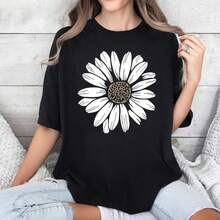 Camiseta Gráfica de Algodón Negra para Mujer con Estampado de Margaritas, Manga Corta, Cuello Redondo, Estilo Casual de Verano, Linda, Moderna, Suave y Cómoda para Uso Diario con Jeans, Shorts y para Combinar con Otras Prendas. - Negro - Ver 1
