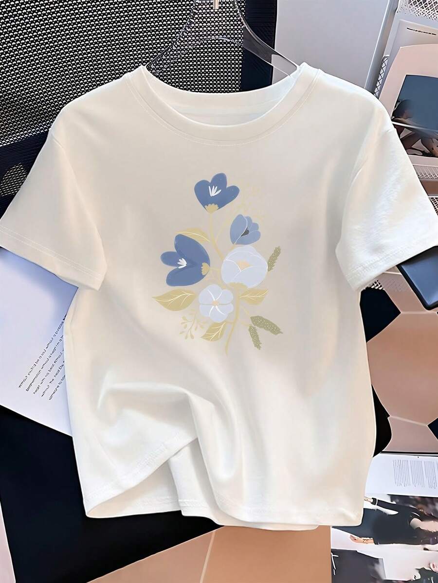 Camiseta Floral para Mujer - Base suave en tono beige rosado con diseño floral azul - Cuello redondo sin elasticidad, top casual y formal - Ajuste cómodo en tallas S-XXL, adecuada para uso diario, trabajo y vacaciones - Tela duradera para atuendos elegantes de uso diario y formal, ropa de oficina. - Blanco - Ver 1