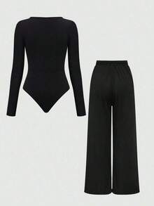 Set de 2 piezas: Top con bajo asimétrico y pantalones de unicolor - Negro - Ver 2